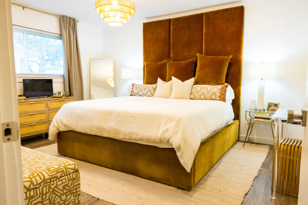 Orange velvet upholstered bed frame by Living Designs Furniture